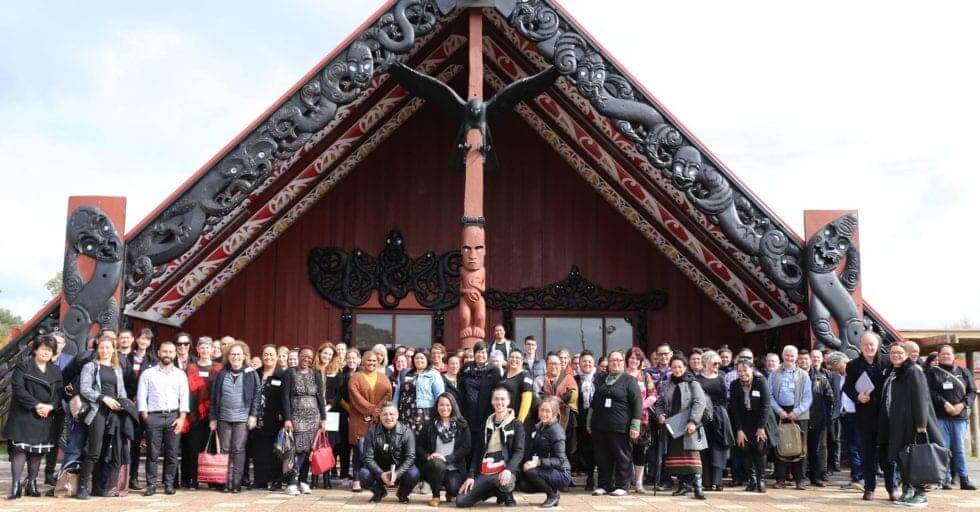 Housing First Team in front of Marae